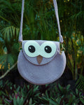 Lavender round sling bag with gold clasps