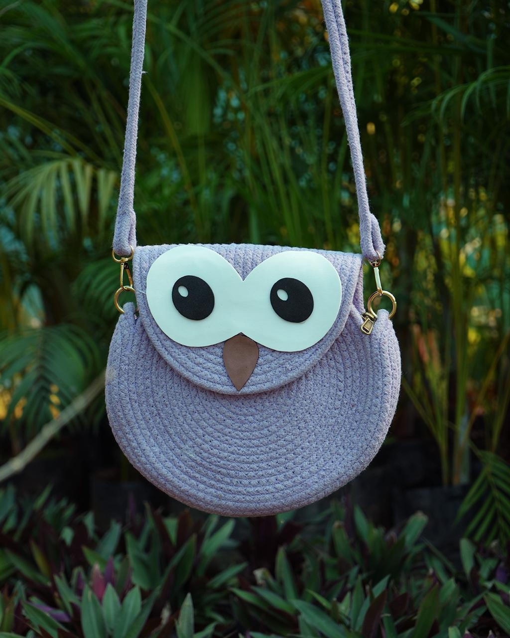 Lavender round sling bag with gold clasps